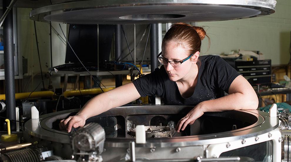 Sophia Rocco working on a machine in the Laboratory of Plasma Physics